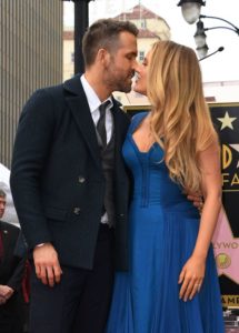 Blake Lively and her husband Ryan Reynolds kissing