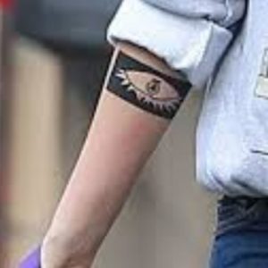 Kristen Stewart did aeye like tattoo on her forearm