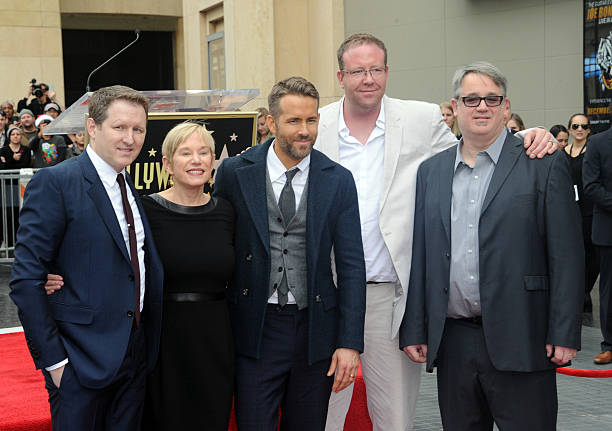 Ryan Reynolds with his brothers and mother