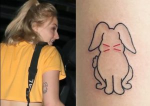 Sophie Turner back of upper right arm rabbit tattoo