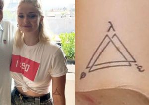 Sophie Turner upper arm tattoo triange