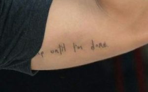 Taylor Lautner tattooed a sentence