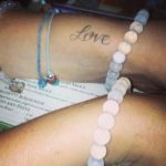 Ashley Green tattooed love on her wrist