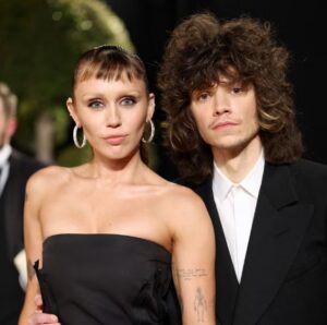 Miley Cyrus with fiance Maxx Morando