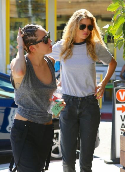 Miley Cyrus with her girlfriend Stella Maxwell