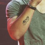 Nick Jonas tattooed Mercy word on his right wrist