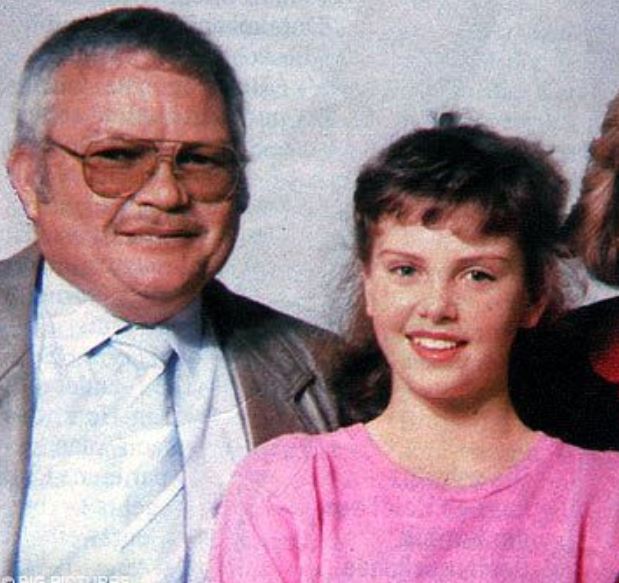 Charlizer Theron with her father Charles Jacobus Theron in childhood image