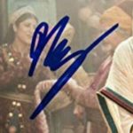 Mena Massoud signature