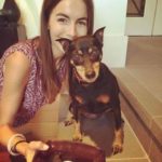 Camilla Belle with her pet