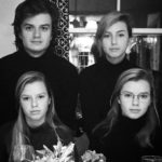 Joe Keery with his 3 younger sisters image