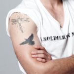 Steven R McQueen Right hand biceps tattoos