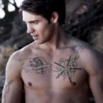 Steven R McQueen chest tattoos