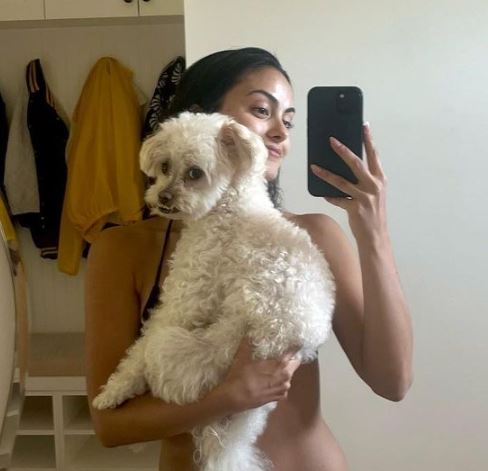 Camila  with her pet dog
