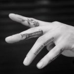 Cody Christian finger tattoos