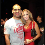 Cain and his wife Michelle Velasquez image.