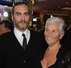 Joaquin Phoenix with mother Arlyn Bottom image