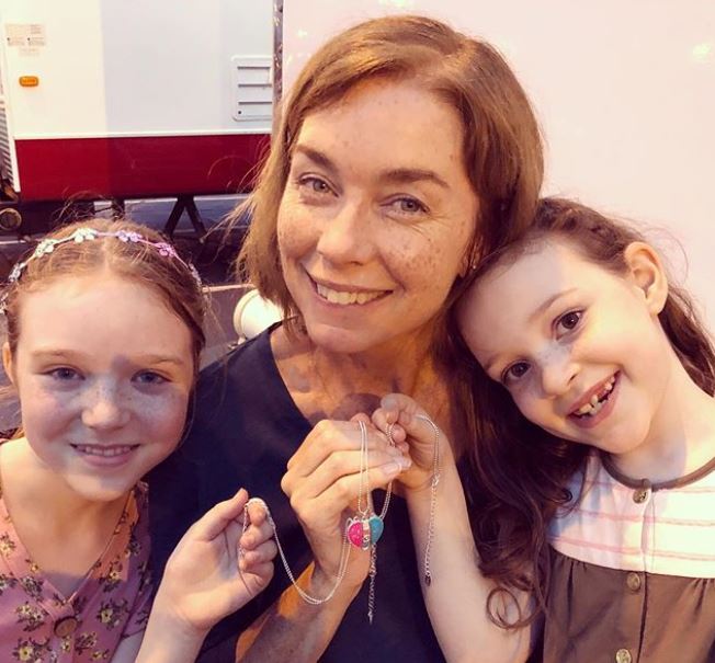 Julianne Nicholson with her daughters.