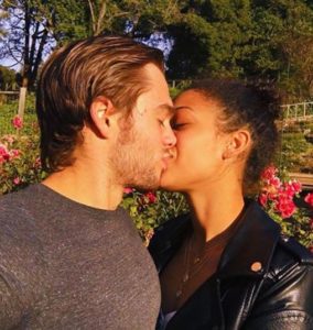 Samantha Logan and her boyfriend Dylan Sprayberry kissing