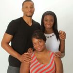 Norman Powell with his sisters