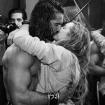 Seth Rollins with girlfriend Becky Lynch kissing
