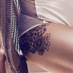 Brianna's thigh tattoo image.
