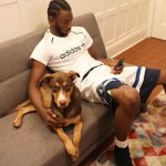 Andrew Wiggins with pet dog