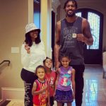 Derrick Favors with partner and children