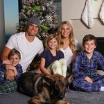 Greg Olsen with with wife and kids
