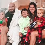 Lane Johnson with wife and children