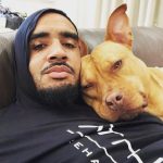 Olivier Vernon and his pet dog