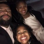 Trent Williams with his daughters