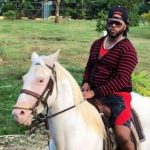 Johnny Cueto with his pet horse