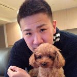 Masahiro Tanaka with his pet dog