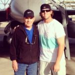 Mike Moustakas with his father