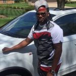 johnny cueto with his car