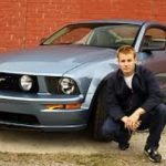 Will Estes with his ford mustang car