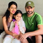 Harbhajan Singh with his wife and daughter
