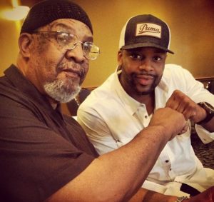 LaRoyce Hawkins with his grandfather John Hawkins