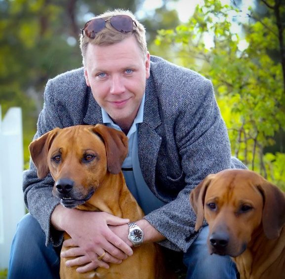 Mikael Persbrandt with his pet dogs