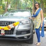 Deepika Padukone with her Audi Q7 car