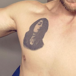 Nathaniel Buzolic's chest tattoo