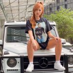 Summer Rae with her car