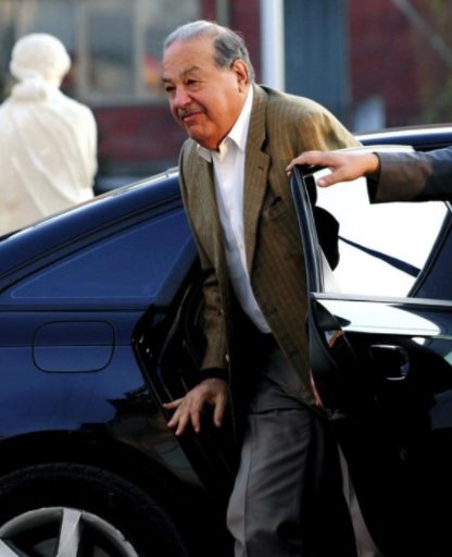Carlos Slim Helu with his car