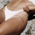 Kelsey Robinson left thigh tattoo