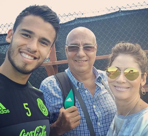 Diego Reyes with his father and mother