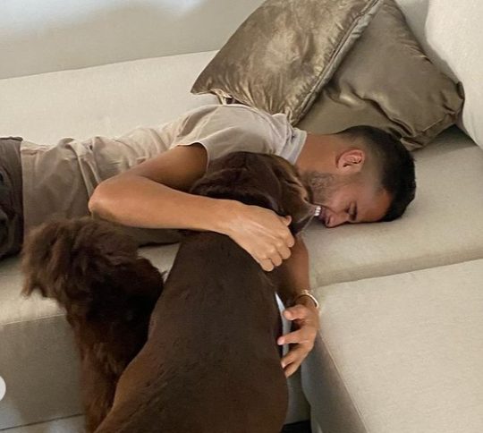 Diego Reyes with his two pet dogs