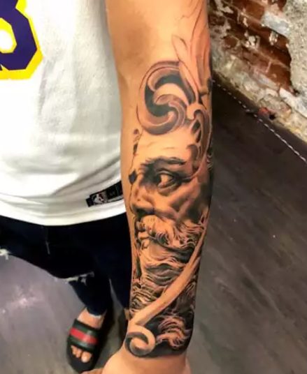 Ishan Kishan with's lefthand tattoos
