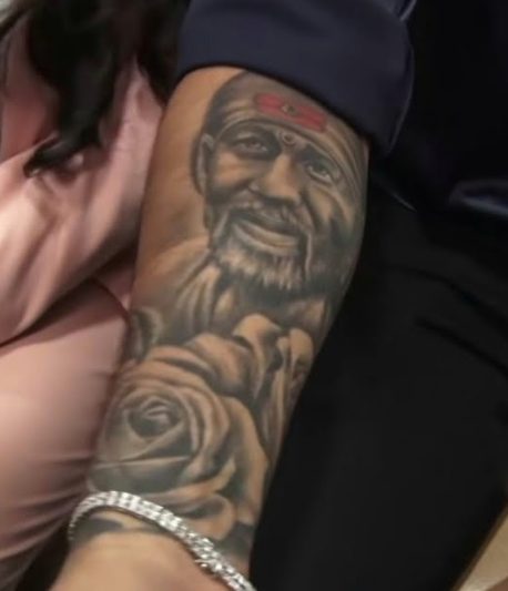 Ishan Kishan with's righthand tattoos