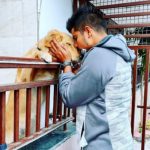 Karn Sharma with his pet dog