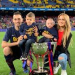 Sergio Busquets with his wife and two son